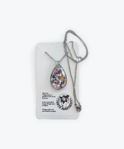 Pendentif fleurs séchées et feuille d'argent dans l'époxy
