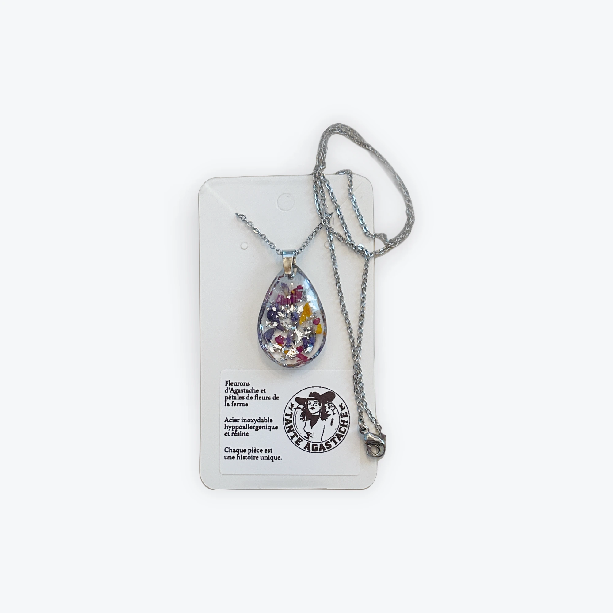 Pendentif fleurs séchées et feuille d'argent dans l'époxy